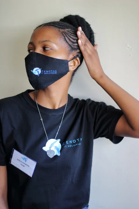 A participant in a Zenotha branded shirt during a session